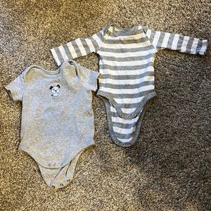 Two grey onesies